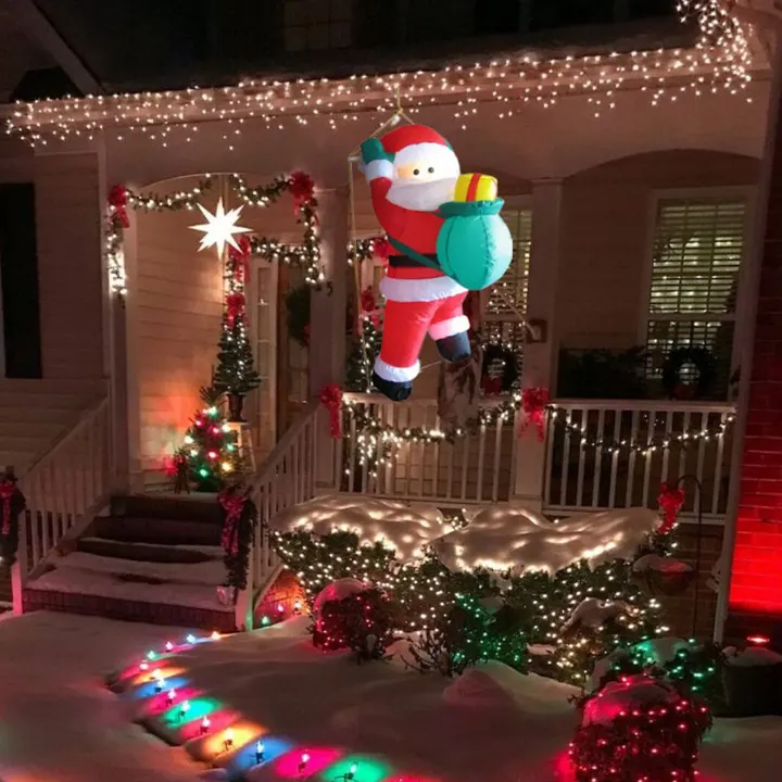 deda mraz penje se na merdevine praznični ukras za interijer euroshop